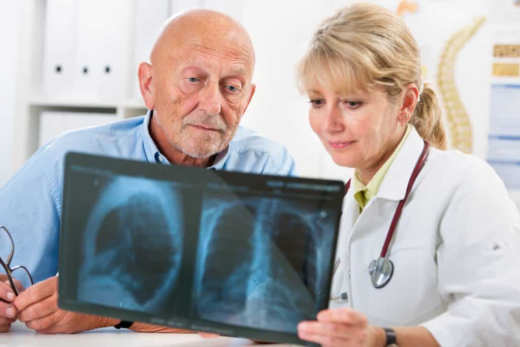 doctor and patient with x-ray