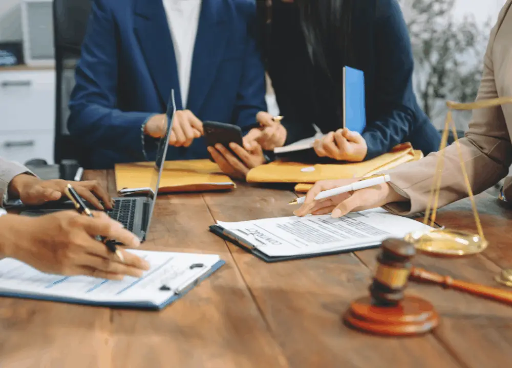 Attorney reviewing jobsite timeline + records folder